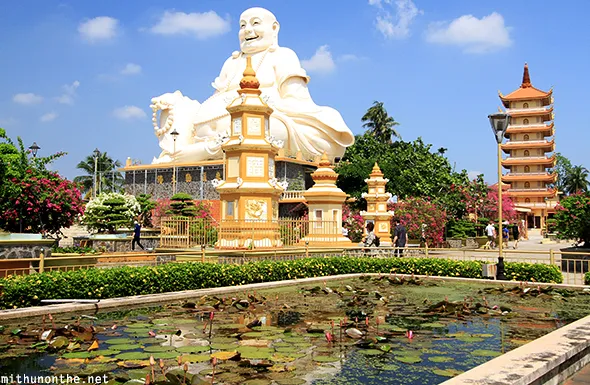laughing buddha vinh trang pagoda vietnam